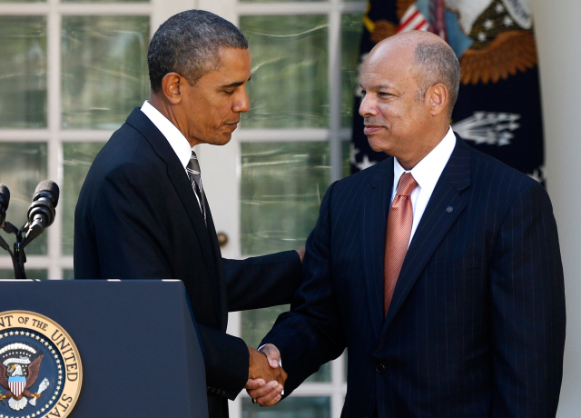 President Barack Obama shakes hands with Jeh Johnson, his choice for the next Homeland Security Secretary, in the Rose Garden at the White House in Washington, Friday, Oct. 18, 2013. Johnson was general counsel at the Defense Department during the wars in Iraq and Afghanistan. (AP Photo/Charles Dharapak)